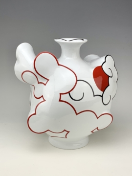 White porcelain vessel with red and white line designs