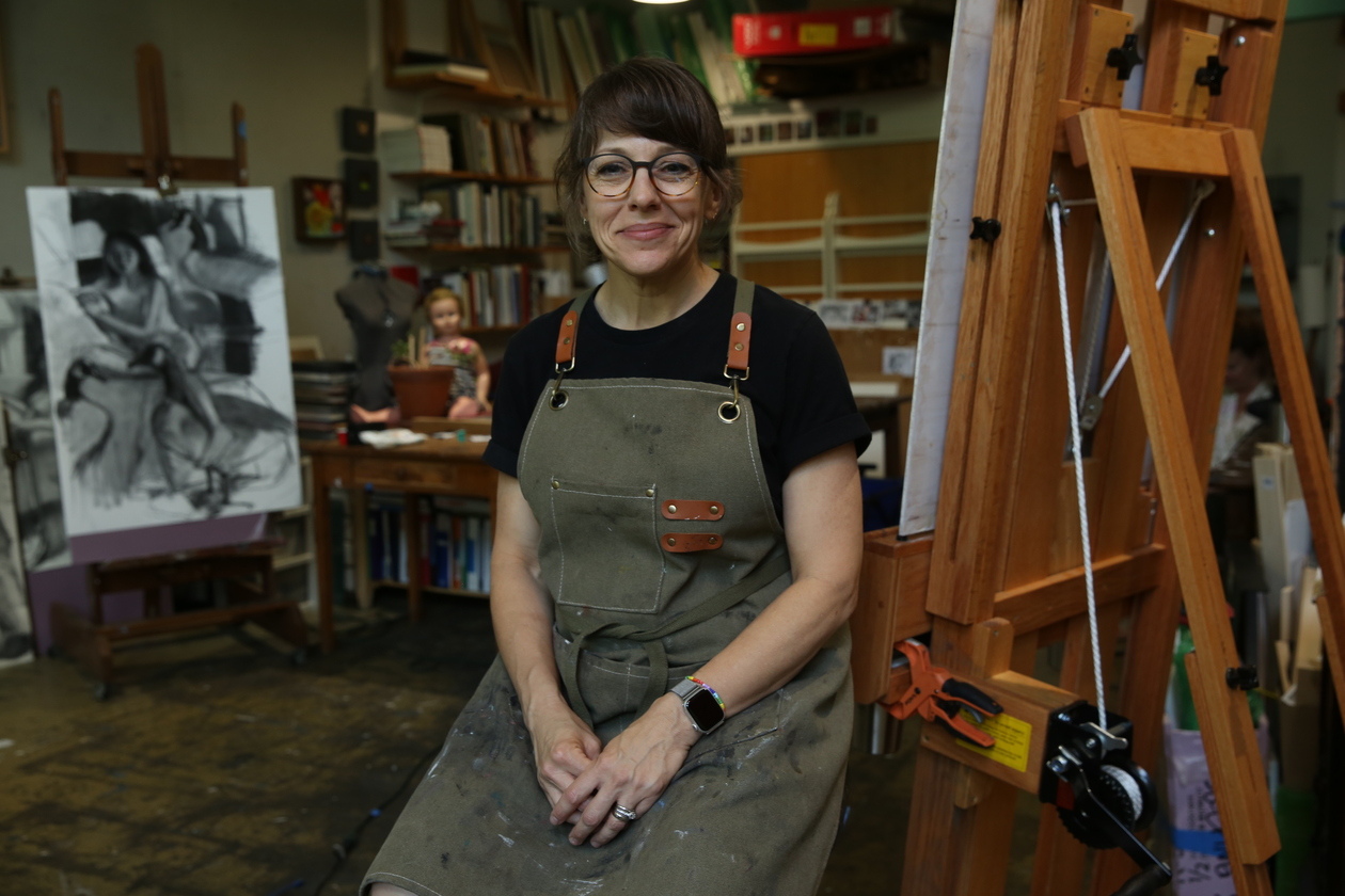 Art professor Nicole Santiago poses in her studio on the William & Mary campus