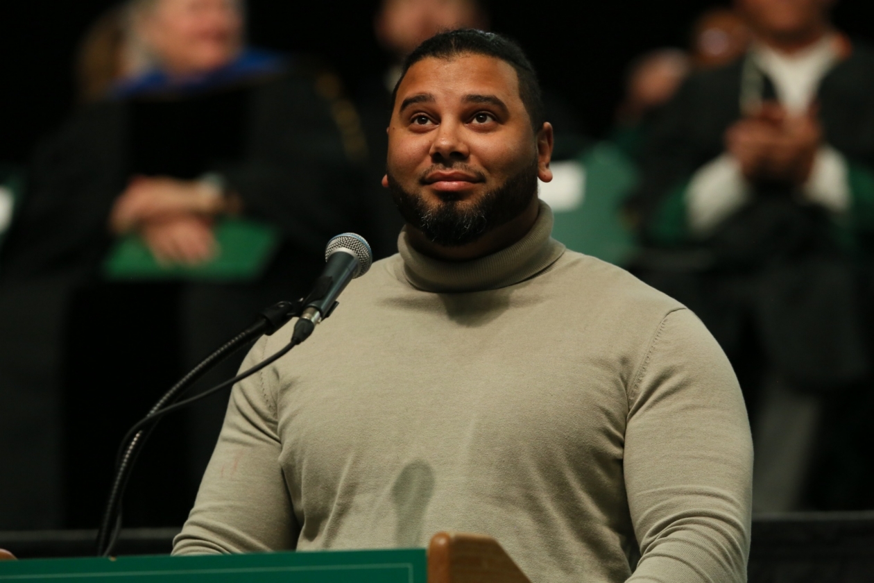 Man in front of a podium.