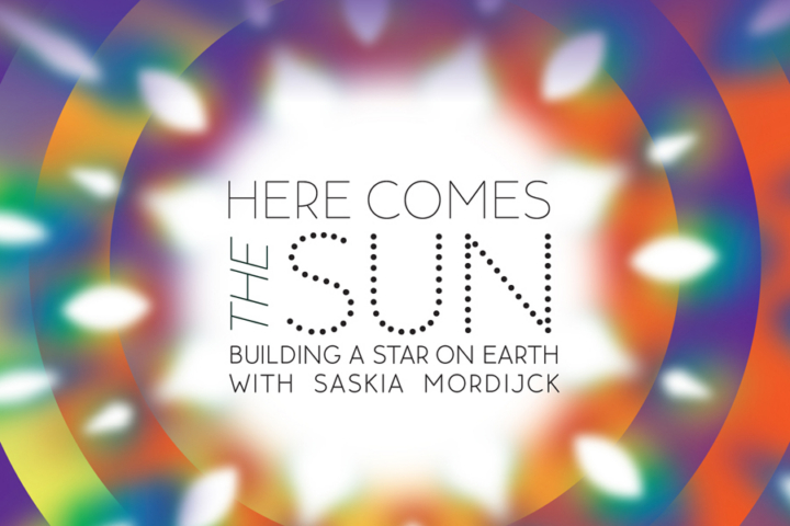 A graphic showing a sunburst surrounded by various colors and the words, "Here comes the sun."