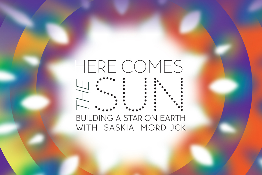 A graphic showing a sunburst surrounded by various colors and the words, "Here comes the sun."