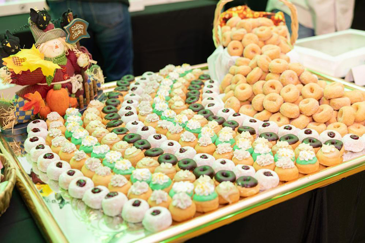 A tray of treats, including mini donuts.