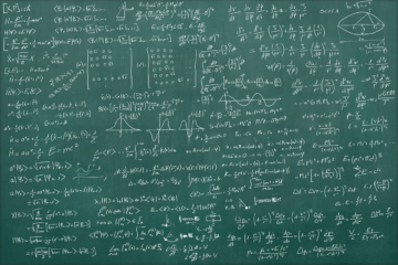 Photo of a blackboard with physics equations