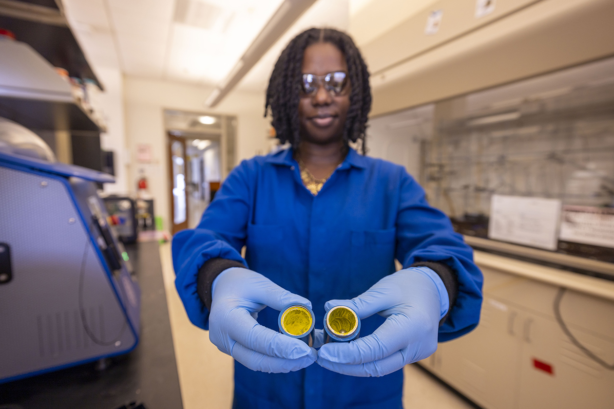 photo of a researcher holding equipment