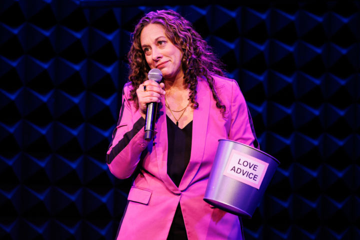 This is a photo of comedienne Jenny Hagel '98, who is appearing at the 2026 Ampersand Festival