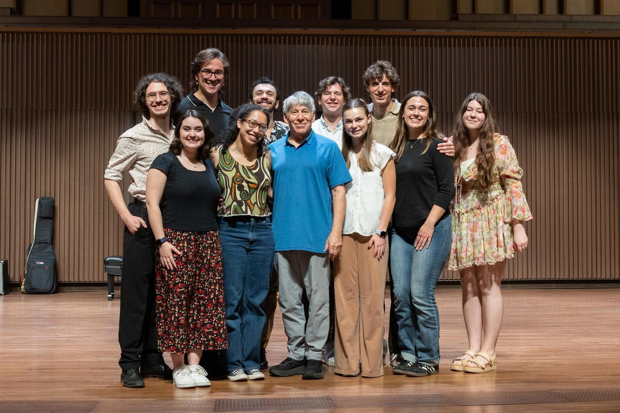 This is a photo of the cast of Godspell with the man who wrote its music, composer Stephen Schwartz