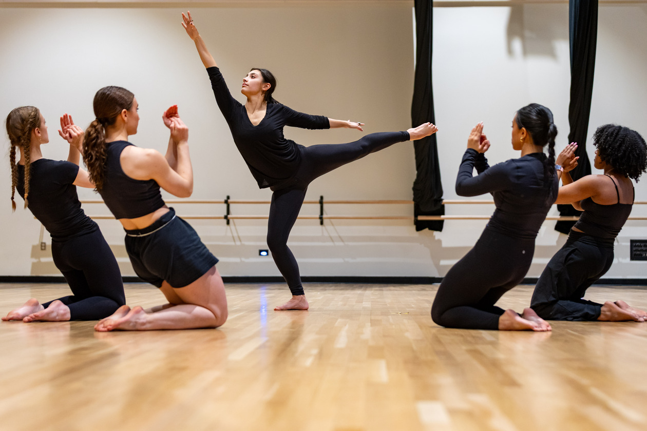 This is a photo of members of professor Leah Glenn's dance company in rehearsal.
