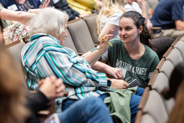 William & Mary employees talk during part of the university's Professional Development Days program