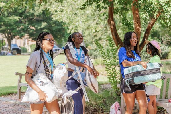 New students unloading their stuff on move-in day for the class of 1930.
