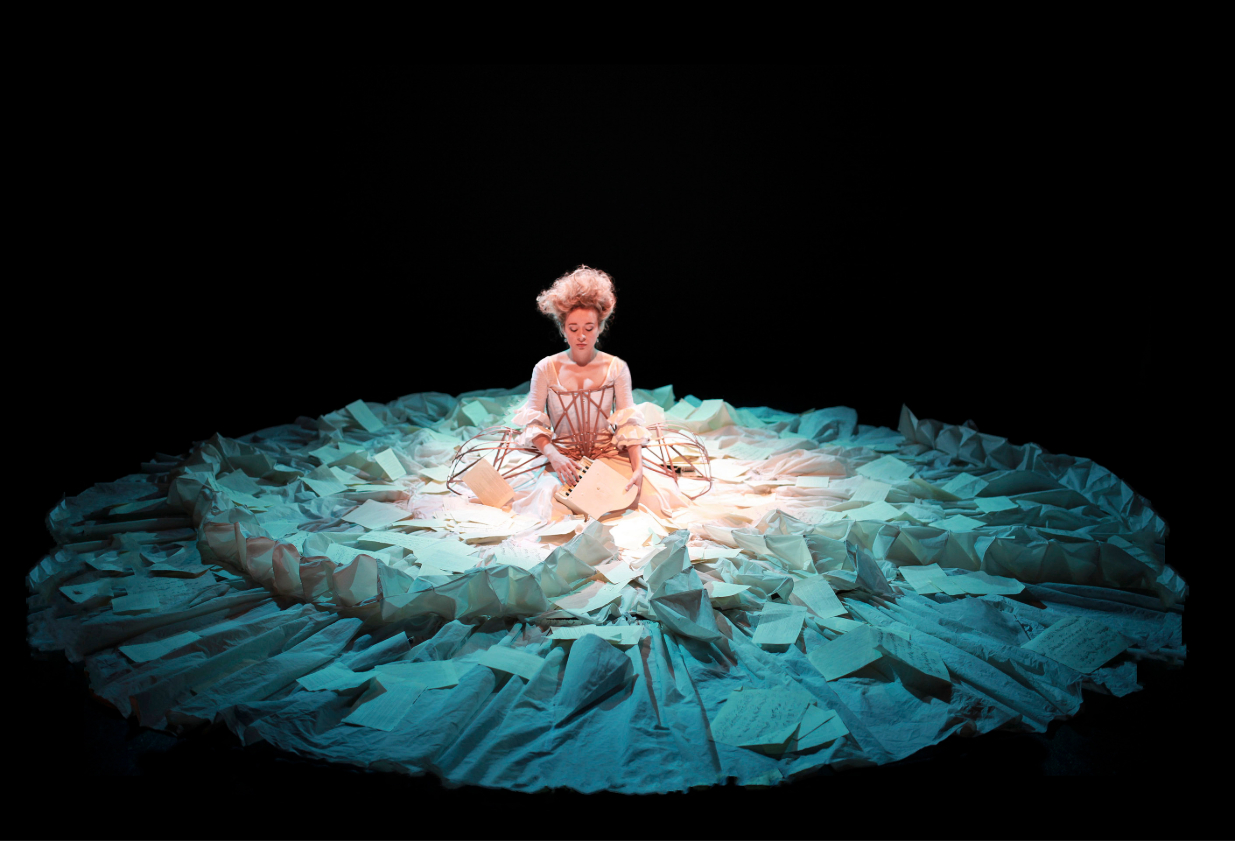 Actress and playwright Sylvia Milo portrays Mozart's unsung sister, Ninnerl, in The Other Mozart, wearing a dress with a circumference of 18 feet