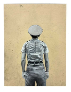 A piece of art shows a person in military uniform facing a wall.