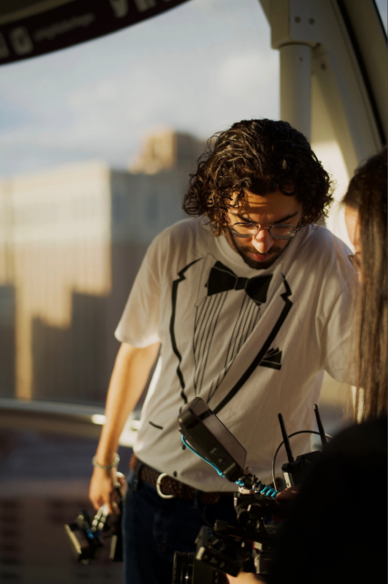 This is a photo of Arjun Fischer '20 working on a film project