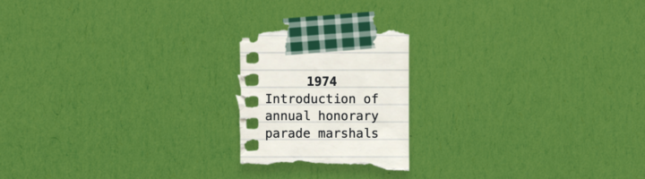 A graphic says 1975 introduction of annual honorary parade marshals.